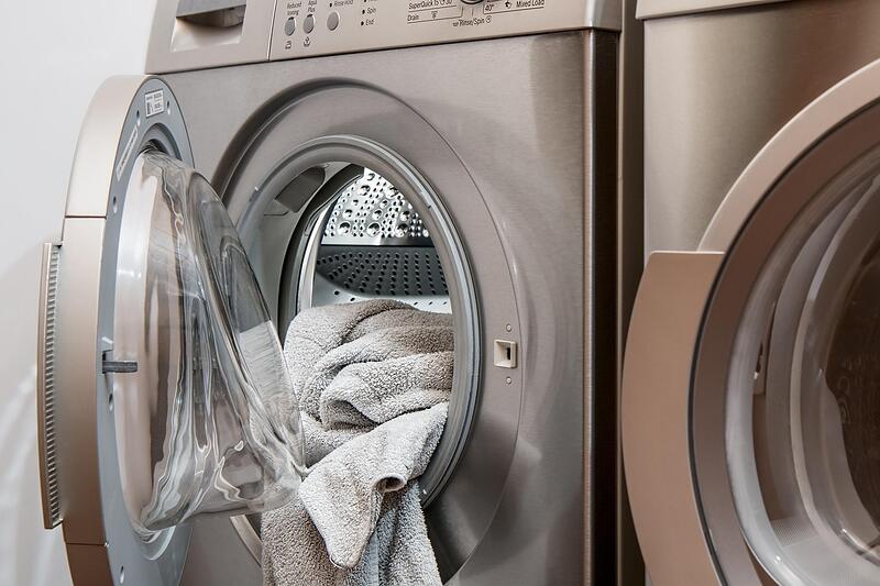 An old washing machine waiting to be hauled away